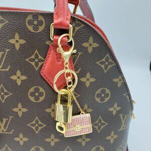 100% Auth Louis Vuitton Lock & Key with unbranded Bagcharm, Keycharm, Keychain